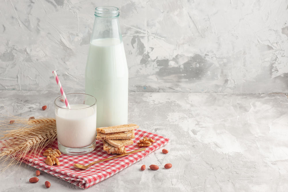 milk in a glass and glass bottle